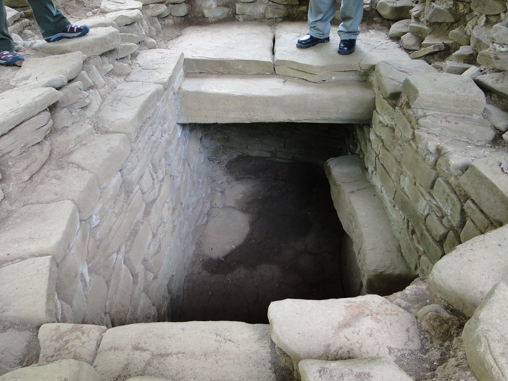 A tomb inside of a Mayan home in Belize.