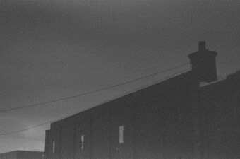 sky with brick building