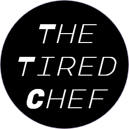 Website logo. A circle with the words, the tired chef inside.