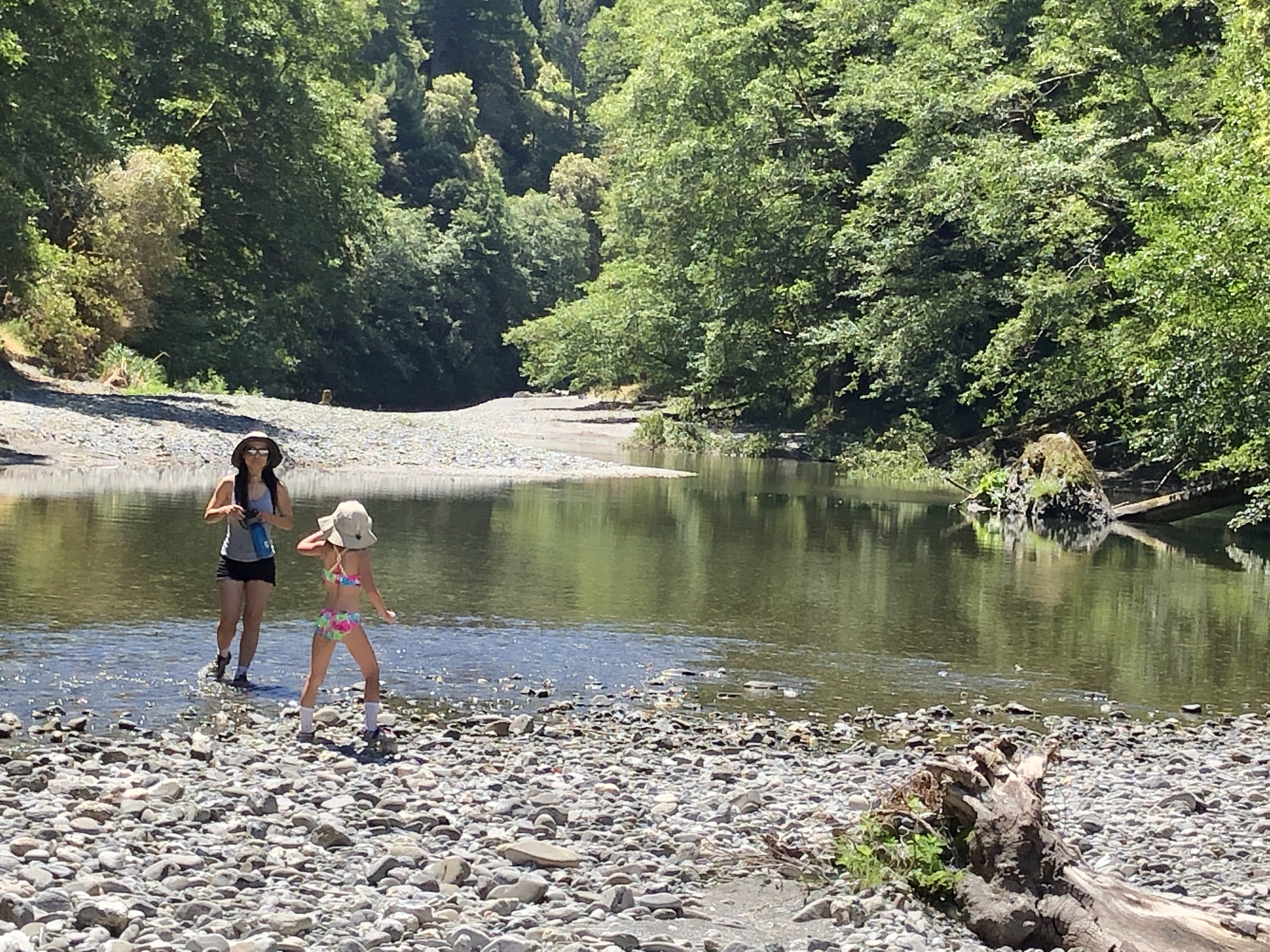 My wife and daughter playing in Redwood Creek.