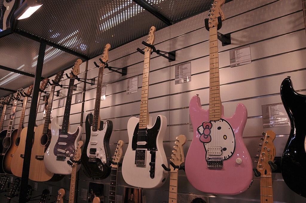 Image of guitars on rack