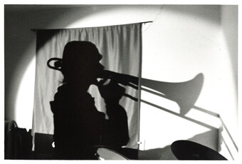 shadow of a trombone player