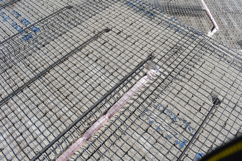 Curved pipes inside roof panels